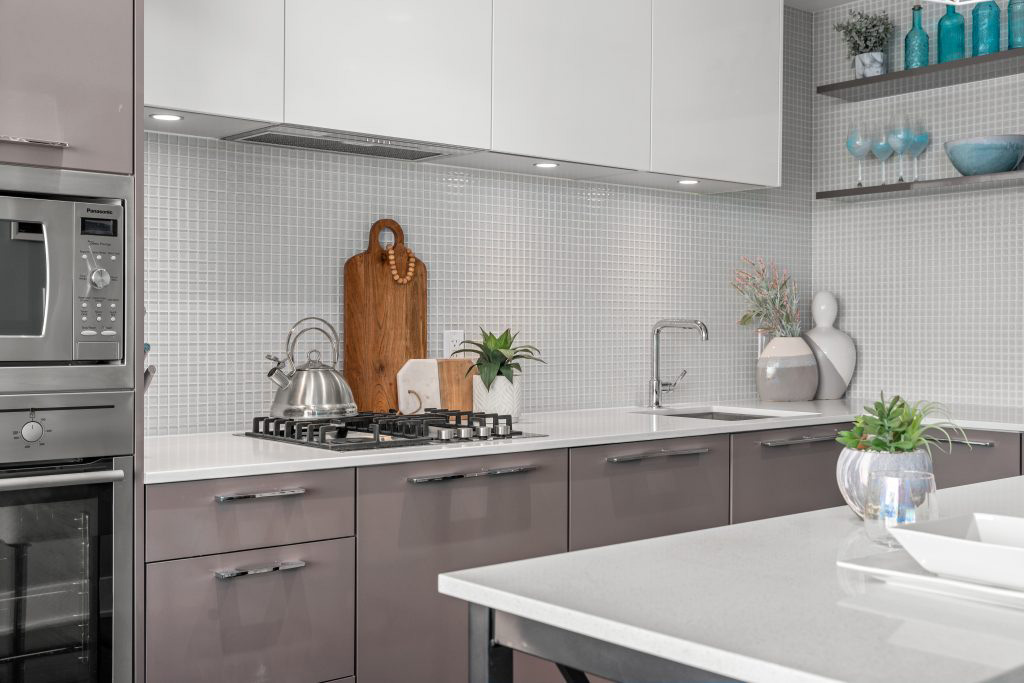 Grey and teal kitchen Trendy chic calgary condo_interior decorating_unshelf design