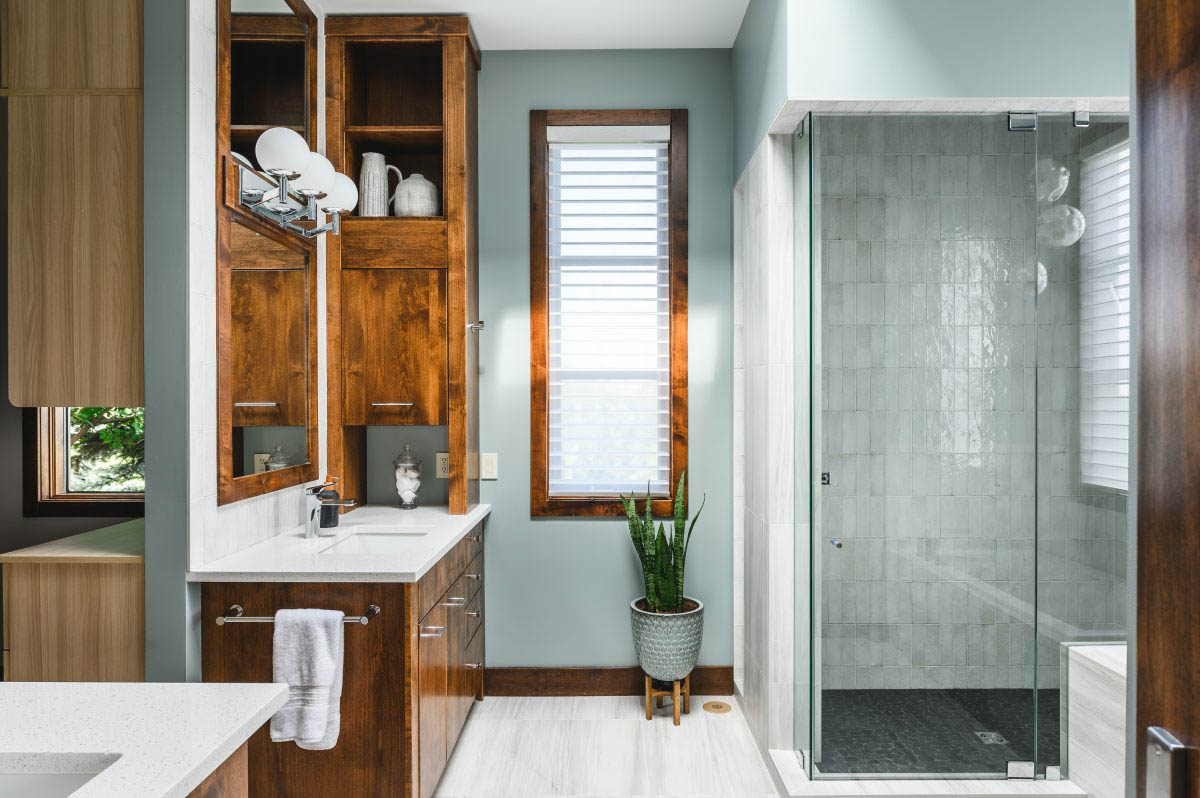 glass standing shower, naturally lit bathroom with optimal storage