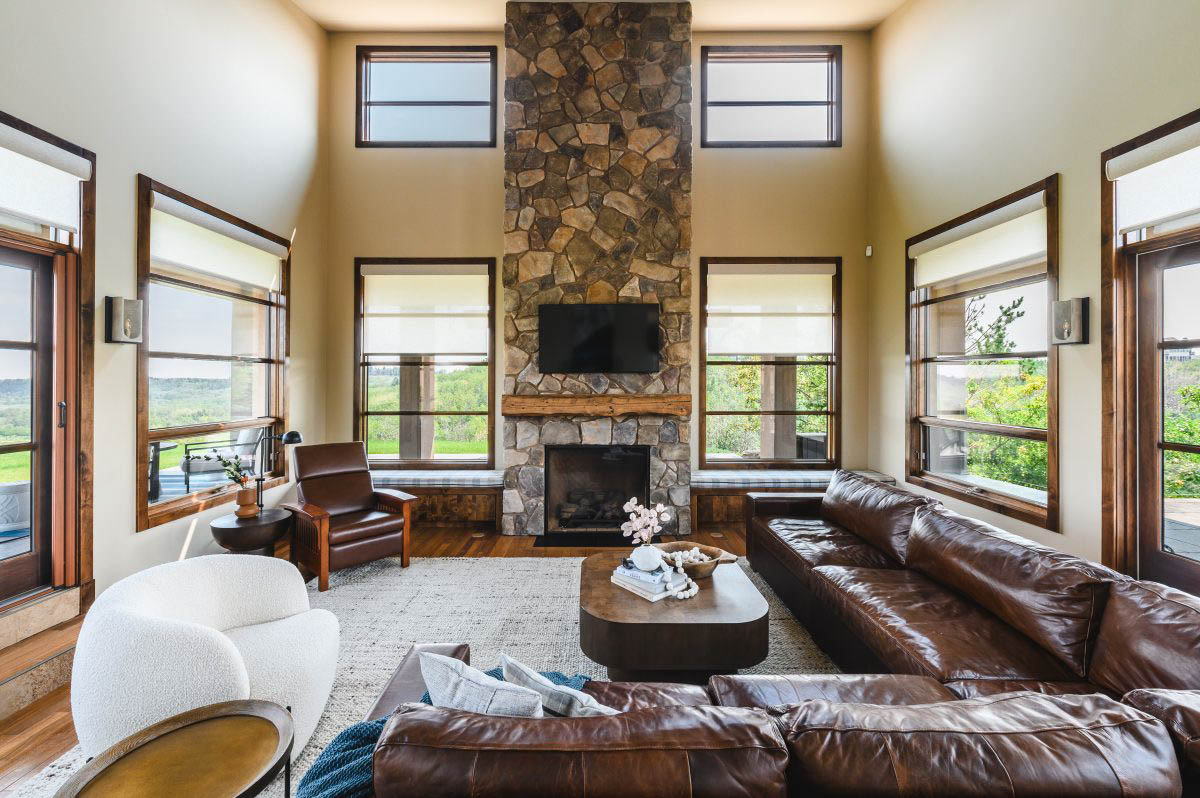 living room design anf style with very high cielings and windows for natural light