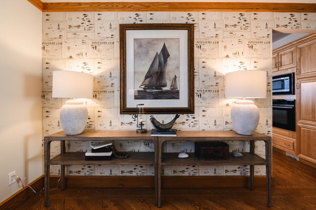 Tuscany Estate_Interior Decorating Living Room Large Wood Console Table Unshelf Design. Console table feature wall with wallpaper and artwork.