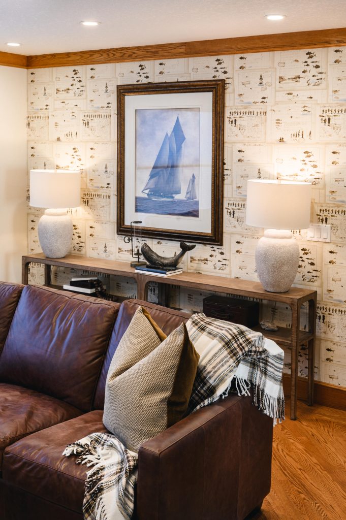 Tuscany Estate Interior Decorating Living Room Modern Console Table Unshelf Design. Leather sofa infront of a large console table.