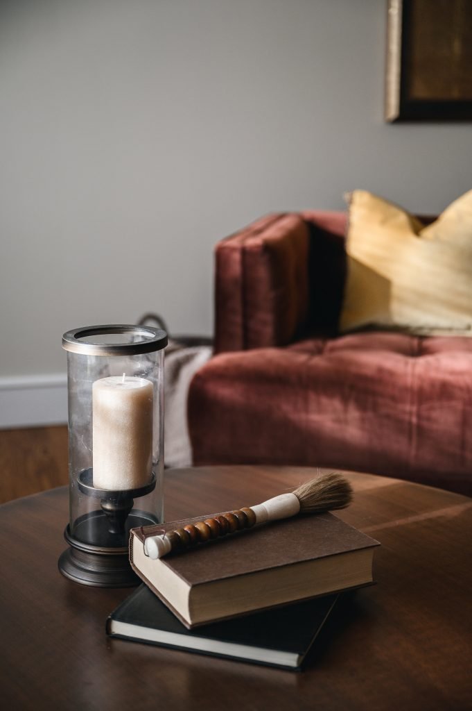 Tuscany Estate Interior Decorating Sitting Room Coffee Table Detail Unshelf Design. Coffee table styling examples.
