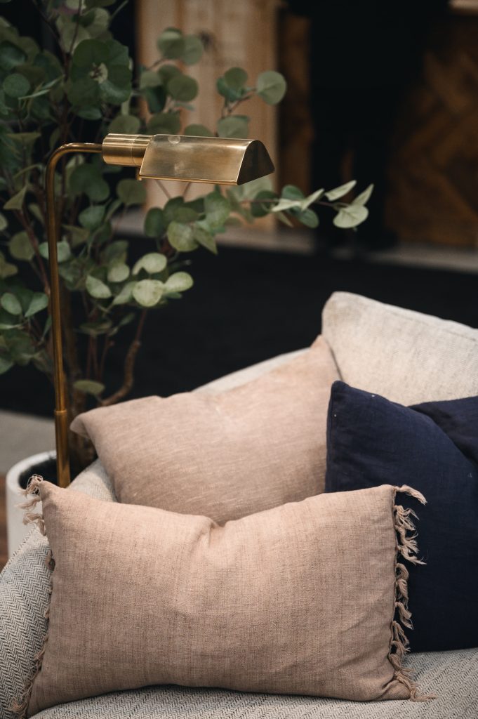 Renovation Show Stately Room Interior Decorating Stately Details of Throw Pillows Unshelf Design. Modern throw pillows on a beige sofa.