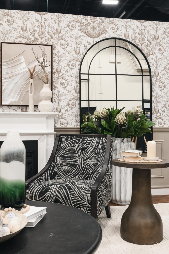 Renovation Show Stately Room Interior Decorating Stately Living Room Black and White Side Chair Unshelf Design. Living room with a feature fireplace wall and modern furniture.