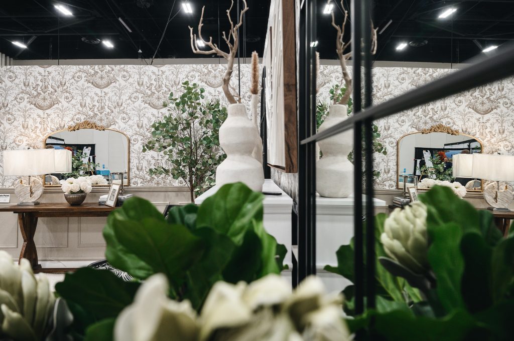 Renovation Show Stately Room Interior Decorating Stately Living Room Large Planter Unshelf Design. Large wood mirror on a large scale patterned wallpaper.