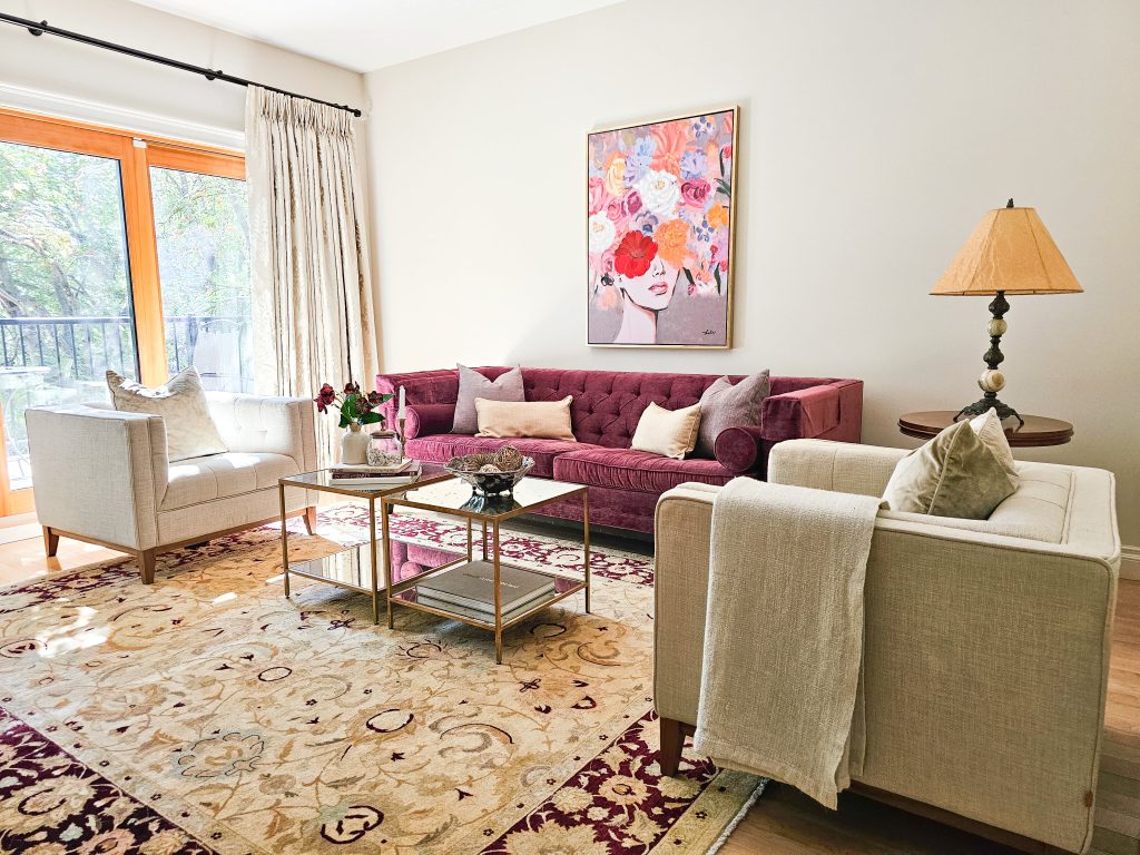 this bedroom had the furniture in it already, which was styled with minmal plant decor and a white duvet cover and pillows