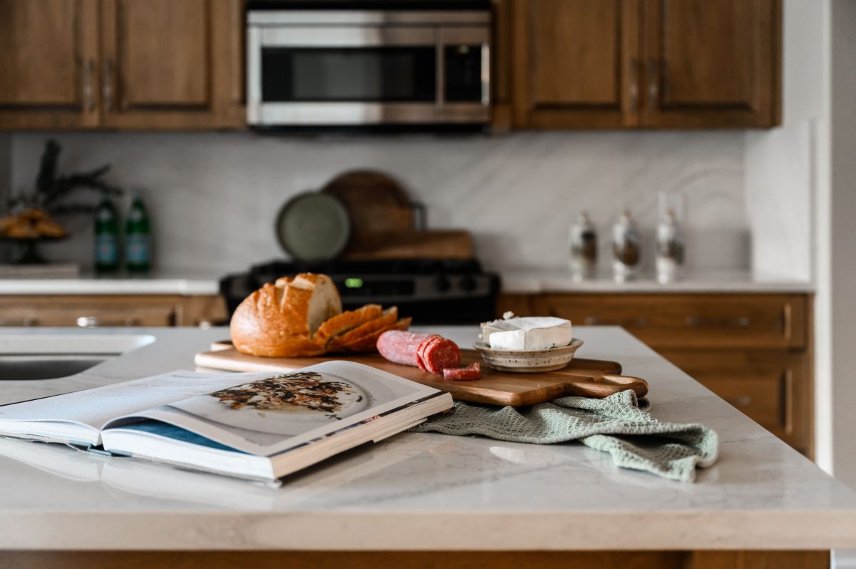 Modern cottage interior design kitchen by Unshelf Design. Warm inviting kitchen decor.