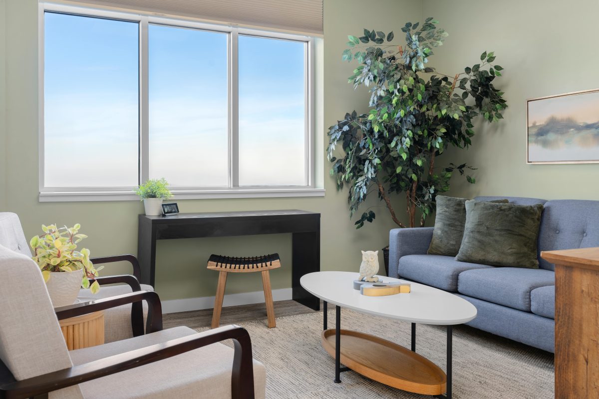 Psychology clinic commercial decorating earthy office Unshelf Design. Earth toned office with seating.