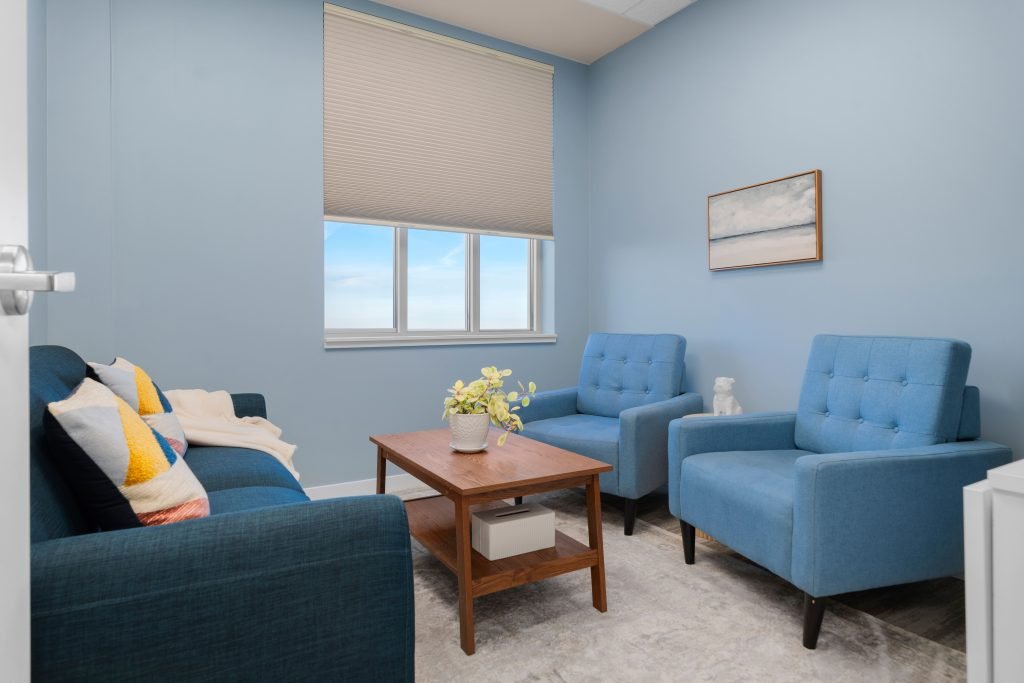 Psychology clinic commercial decorating serene blue office Unshelf Design. Peaceful blue children's psychology office.