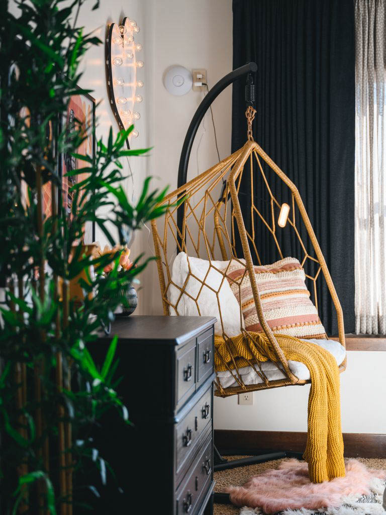yellow swinging chair in bedroom