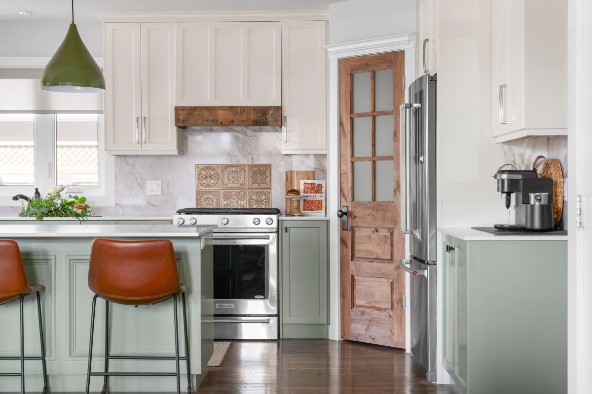 Modern ranch bungalow interior design and furnishing soft green kitchen Unshelf Design