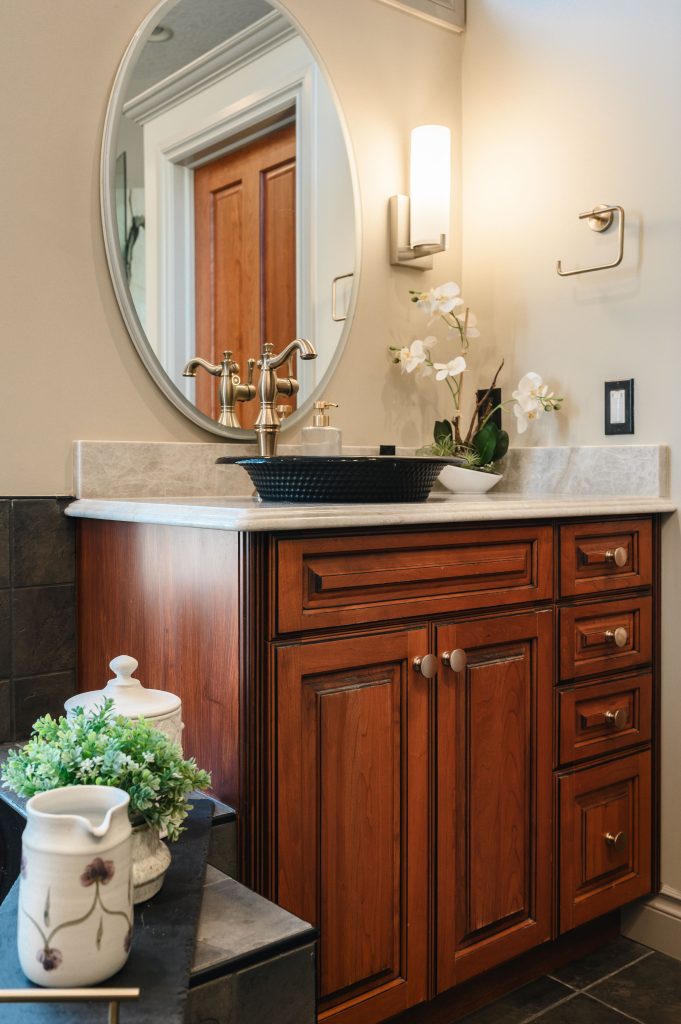 old world italian kitchen and bath renovation interior design and furnishing bathroom vanity round mirror unshelf design