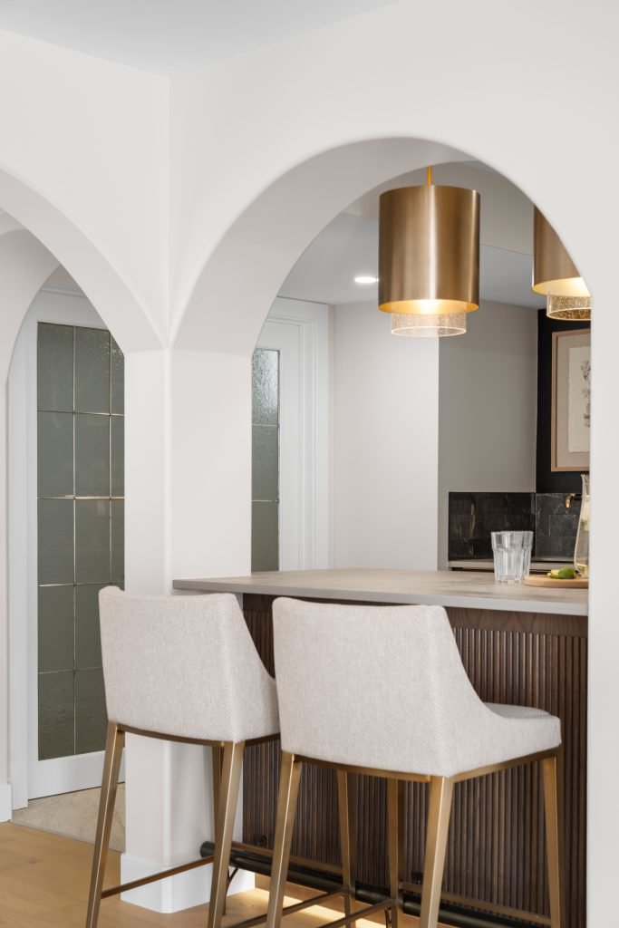 basement wellness space build out interior design and furnishing cream bar height chairs unshelf design