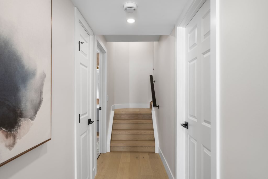 basement wellness space build out interior design and furnishing hallway view unshelf design