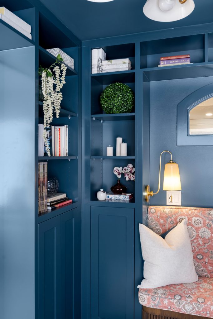 basement wellness space build out interior design and furnishing home library built in shelving unshelf design