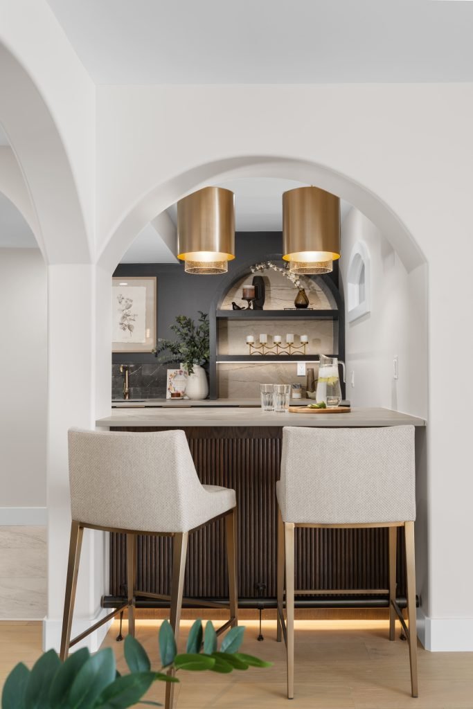 basement wellness space build out interior design and furnishing wet bar gold tones unshelf design