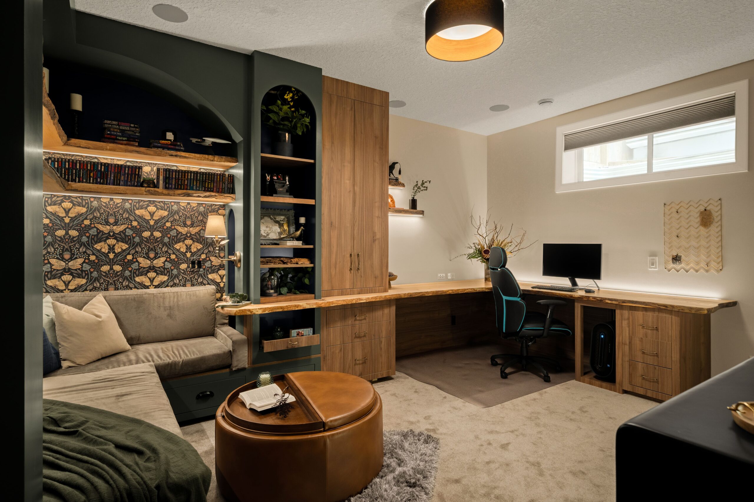 A combined home office and reading nook featuring a live-edge wood desk and a cozy reading nook with built-in bookshelves.
